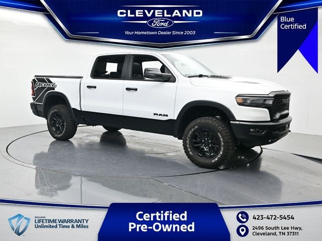 2025 RAM 1500 Rebel in Bright White Clearcoat — front three-quarter view