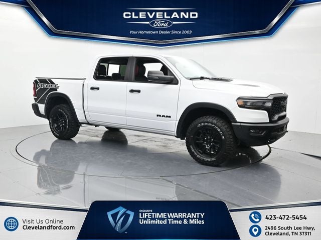 2025 RAM 1500 Rebel in Bright White Clearcoat — front three-quarter view