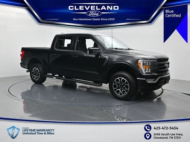 2023 Ford F-150 Lariat in Black Metallic — front three-quarter view