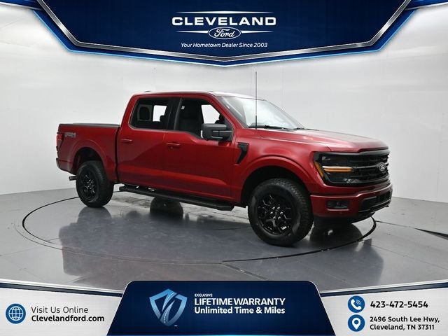 2026 Ford F-150 XLT in Ruby Red Metallic Tinted Clearcoat — front three-quarter view
