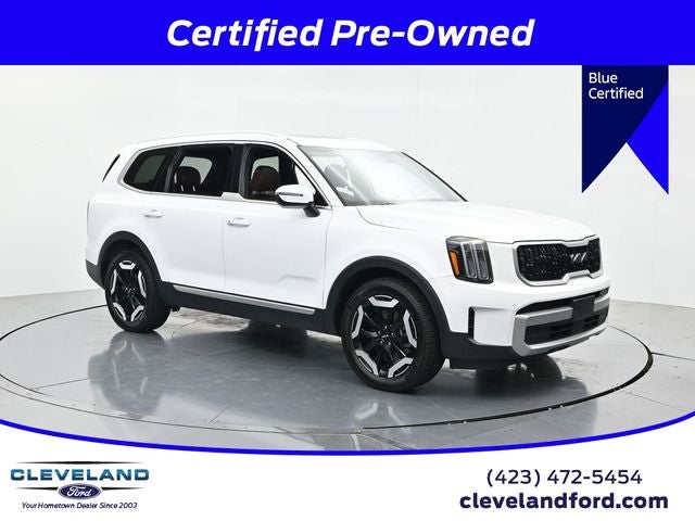 2024 Kia Telluride EX in Glacial White Pearl — front three-quarter view